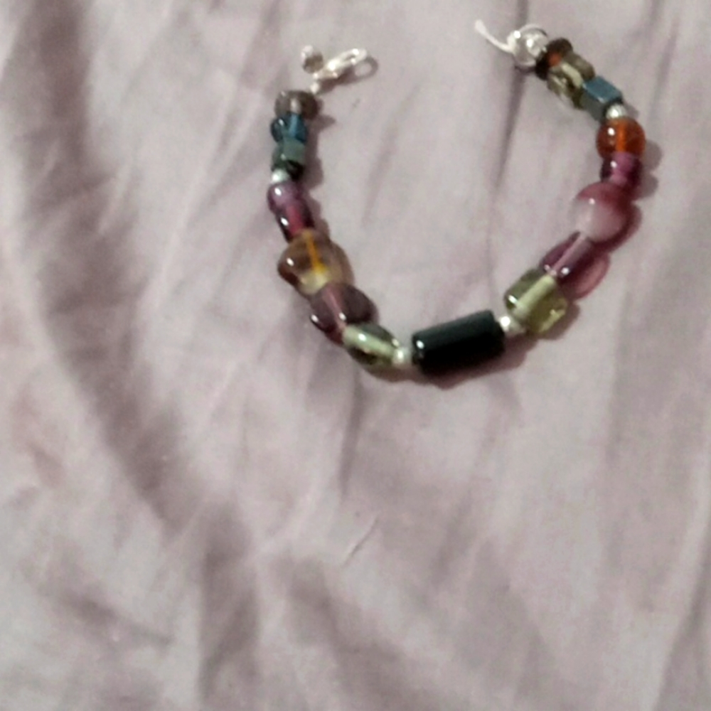 A handmaid glass beaded bracelet.